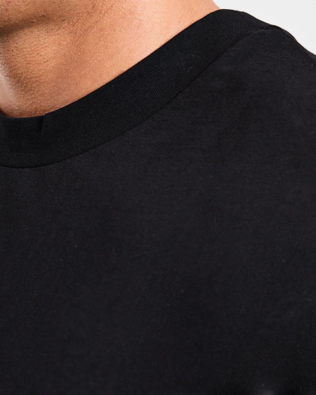 Close-up van het OWN LANE SIGNATURE T-shirt