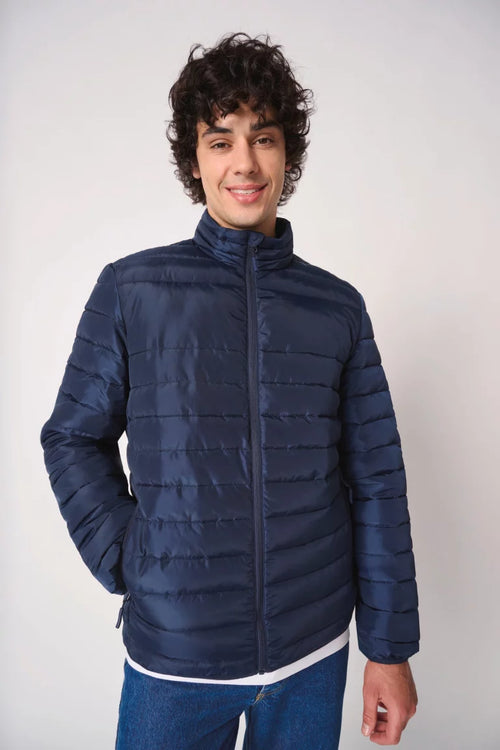 Voorkant van de blauwe OWN LANE CORE Puffer
